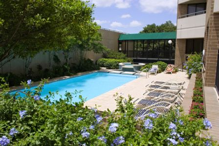 The Enclave at 1550 featuring Sparkling Pool