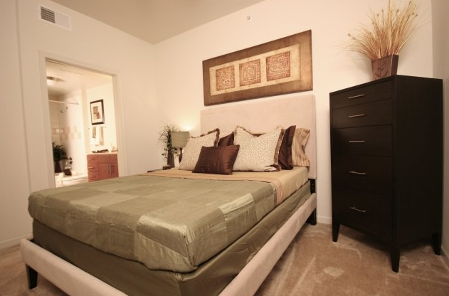 Bedroom at Village on the Green Apartments